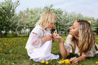 girl with mother in the park