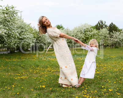 girl with mother in the park