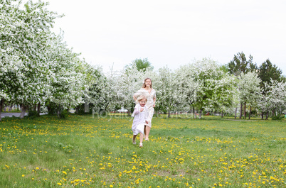 girl with mother in the park