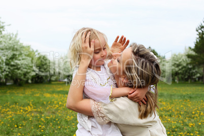 girl with mother in the park