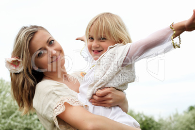 girl with mother in the park