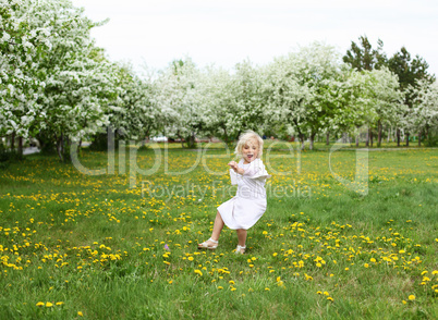 little girl in spring park