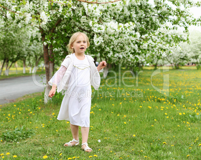 little girl in spring park