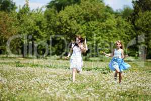 two girls playing in the park