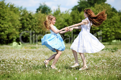 two girls playing in the park