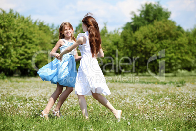 two girls playing in the park