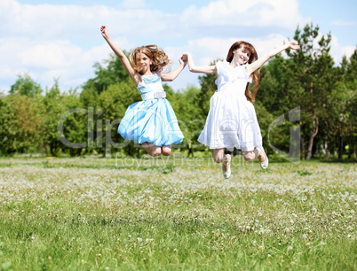 two girls playing in the park