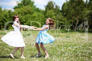 two girls playing in the park