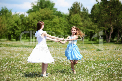 two girls playing in the park