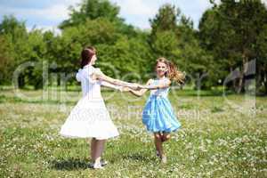 two girls playing in the park