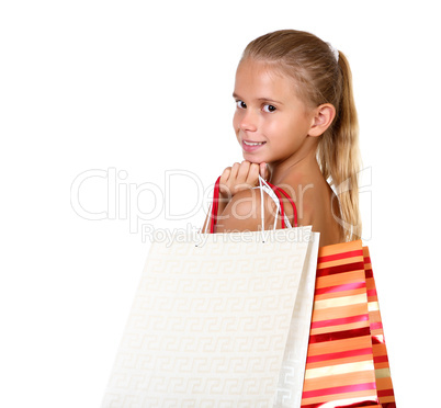 Pretty teenage girl with shopping bags