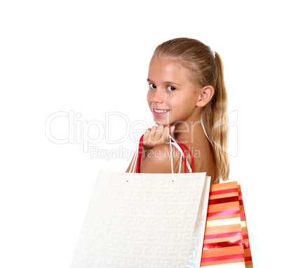 Pretty teenage girl with shopping bags