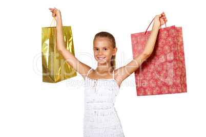 Pretty teenage girl with shopping bags