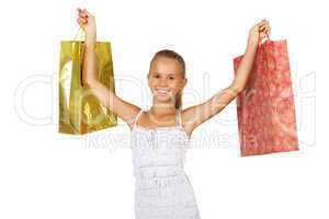 Pretty teenage girl with shopping bags