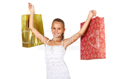 Pretty teenage girl with shopping bags