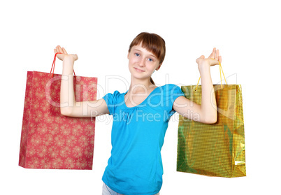 Pretty teenage girl with shopping bags