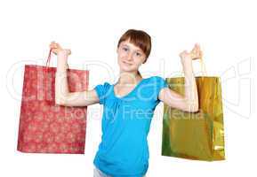 Pretty teenage girl with shopping bags