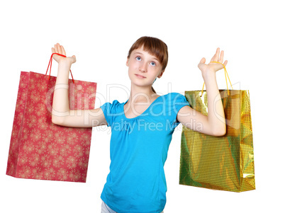 Pretty teenage girl with shopping bags