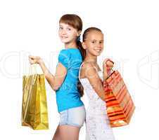 Pretty teenage girls with shopping bags