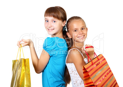 Pretty teenage girls with shopping bags