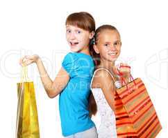 Pretty teenage girls with shopping bags