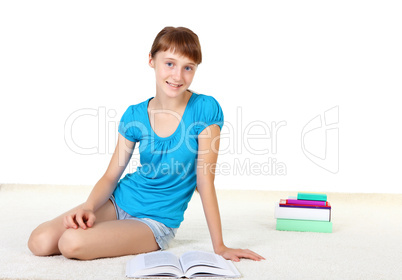 Pretty teenage girl with books