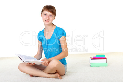 Pretty teenage girl with books