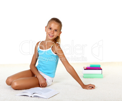 Pretty teenage girl with books