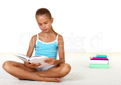 Pretty teenage girl with books