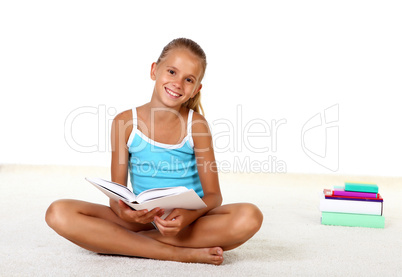 Pretty teenage girl with books