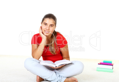 Pretty teenage girl with books