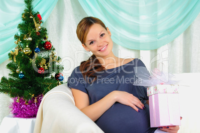 Portrait of a young pregnant girl