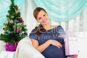 Portrait of a young pregnant girl