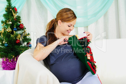 Portrait of a young pregnant girl