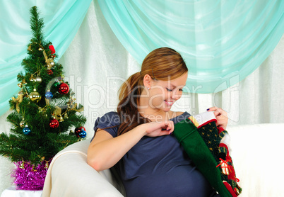 Portrait of a young pregnant girl