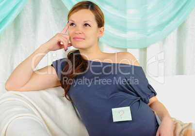 Portrait of a young pregnant girl