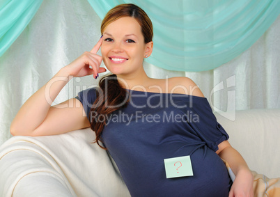 Portrait of a young pregnant girl