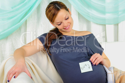 Portrait of a young pregnant girl