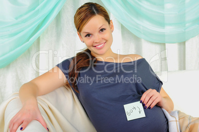 Portrait of a young pregnant girl