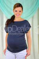 Portrait of a young pregnant girl