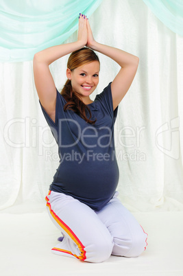 Portrait of a young pregnant girl