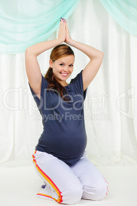 Portrait of a young pregnant girl