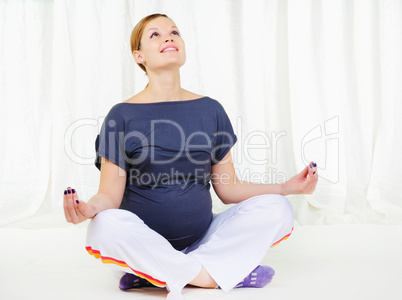 Portrait of a young pregnant girl