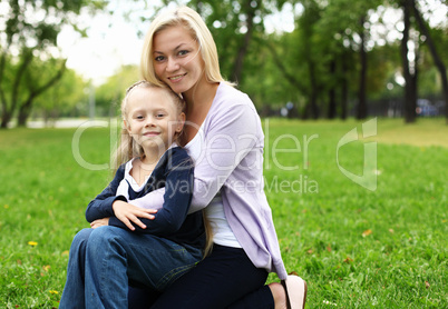 Mother and daughter in park