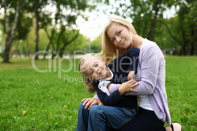 Mother and daughter in park