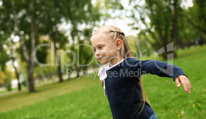 Little girl in park