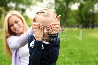 Mother and daughter in park