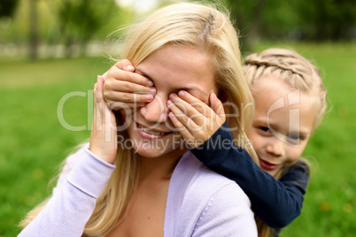 Mother and daughter in park