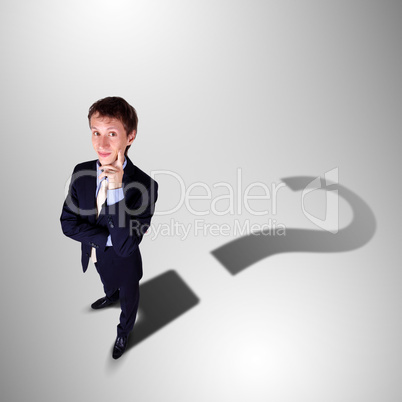 Businessman with shadow as a currency symbol