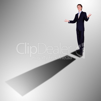 Businessman with shadow as a currency symbol